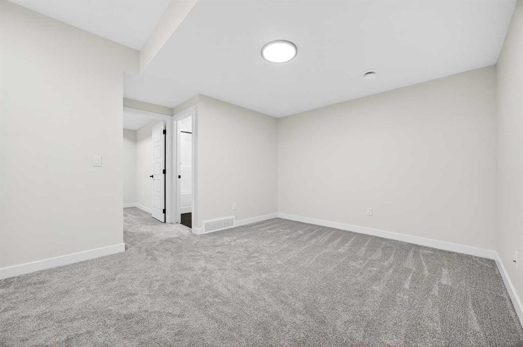 306 Alpine Boulevard, Calgary, AB - Indoor Photo Showing Other Room
