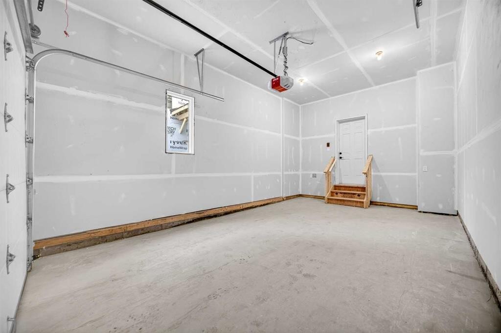 306 Alpine Boulevard, Calgary, AB - Indoor Photo Showing Garage