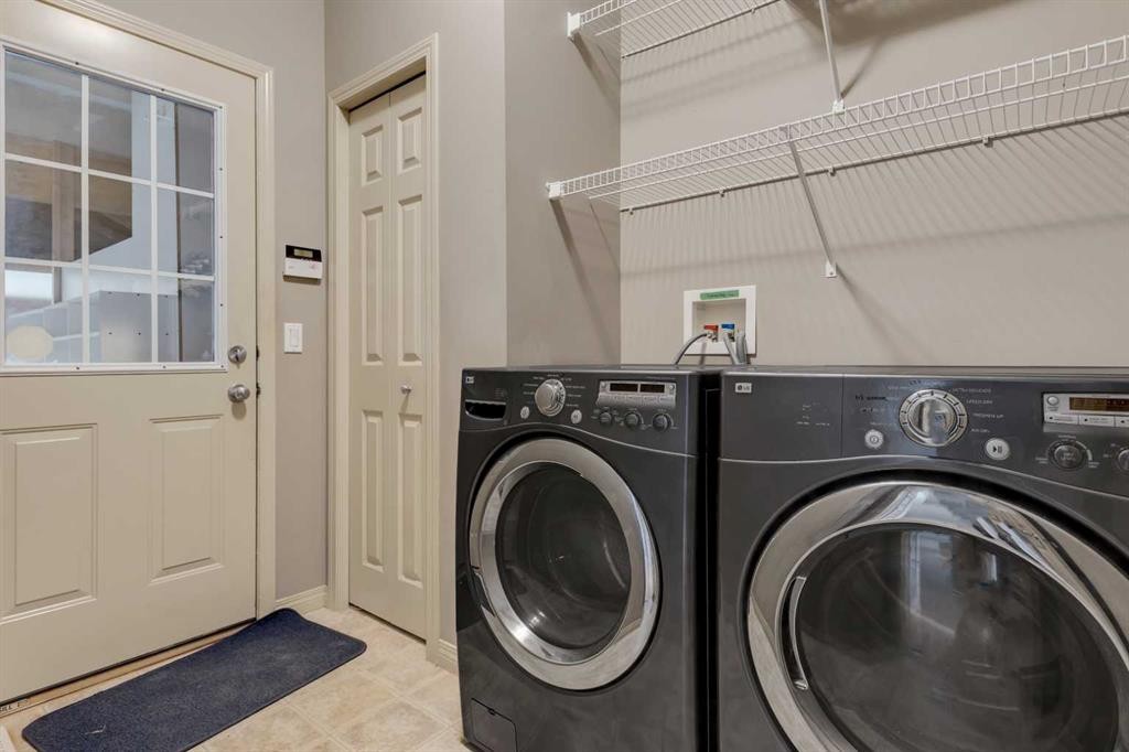 71 Kincora Park, Calgary, AB - Indoor Photo Showing Laundry Room