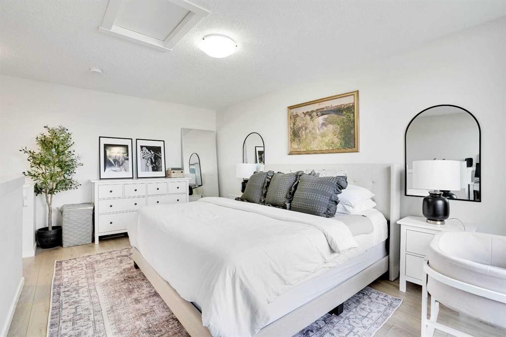 128 Cranbrook Square Se, Calgary, AB - Indoor Photo Showing Bedroom