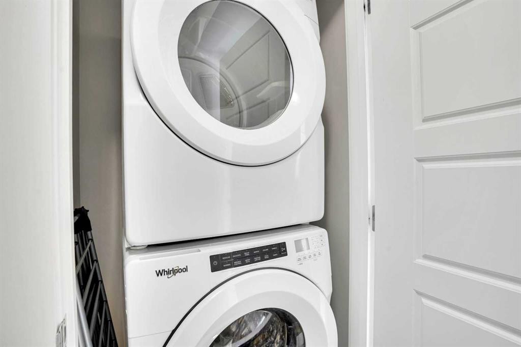 128 Cranbrook Square Se, Calgary, AB - Indoor Photo Showing Laundry Room