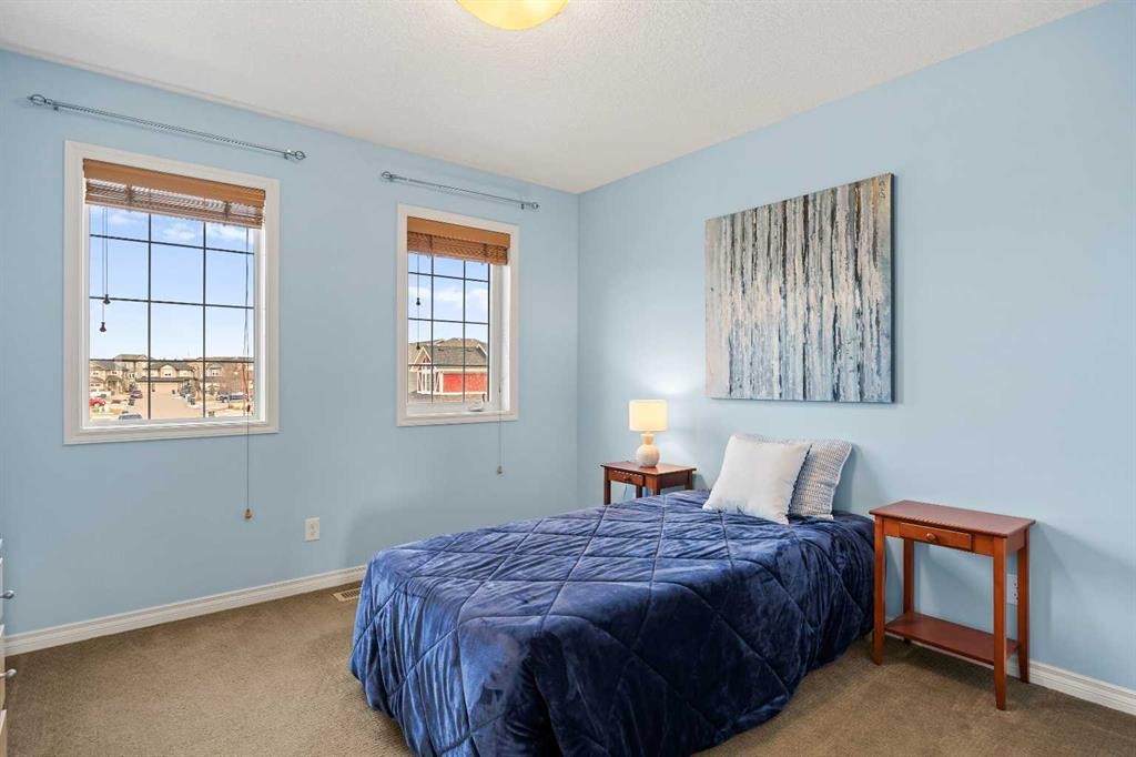 43 Ranchers Crescent, Okotoks, AB - Indoor Photo Showing Bedroom