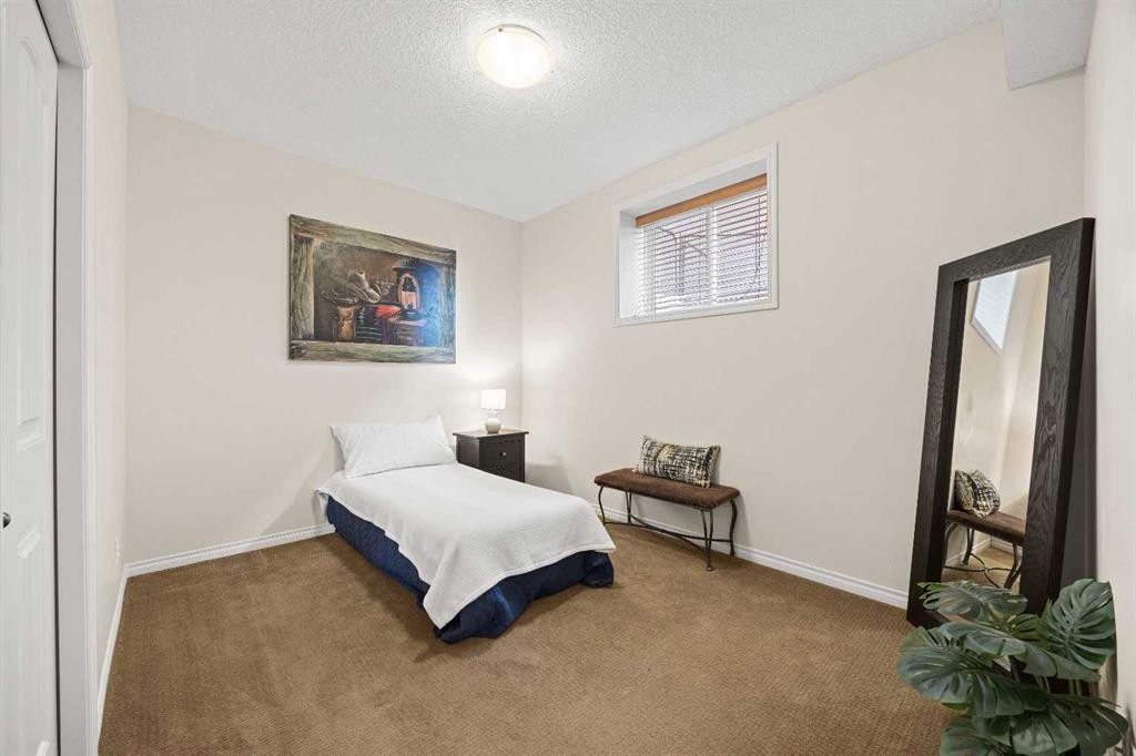 43 Ranchers Crescent, Okotoks, AB - Indoor Photo Showing Bedroom