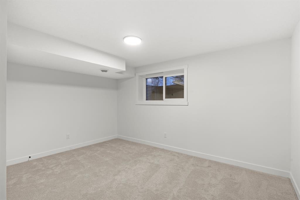 27 Glacier Drive Sw, Calgary, AB - Indoor Photo Showing Other Room