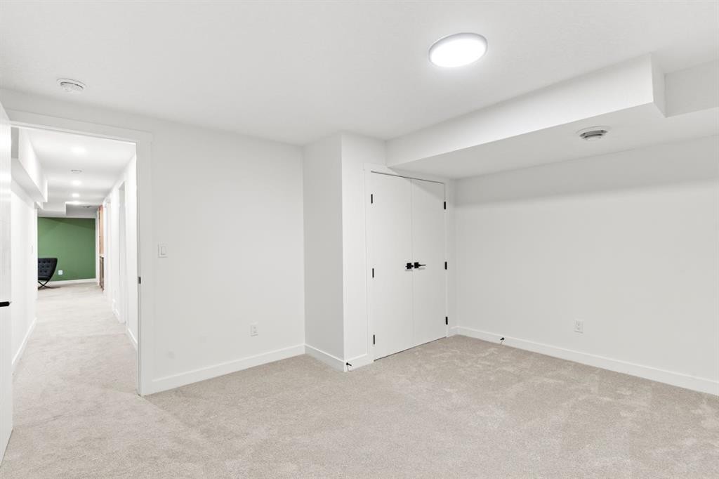 27 Glacier Drive Sw, Calgary, AB - Indoor Photo Showing Other Room