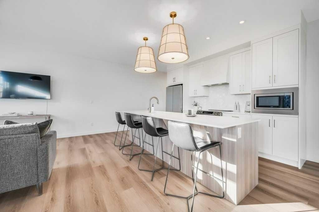 2316-200 Seton Circle Se, Calgary, AB - Indoor Photo Showing Kitchen With Upgraded Kitchen