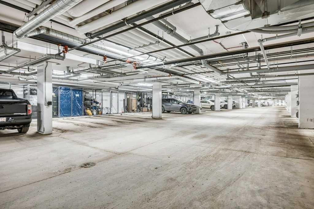 2316-200 Seton Circle Se, Calgary, AB - Indoor Photo Showing Garage