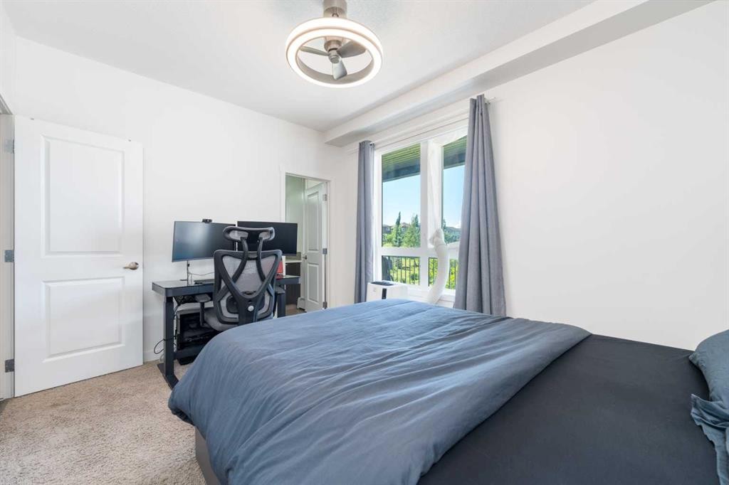 2205-175 Silverado Boulevard Sw, Calgary, AB - Indoor Photo Showing Bedroom