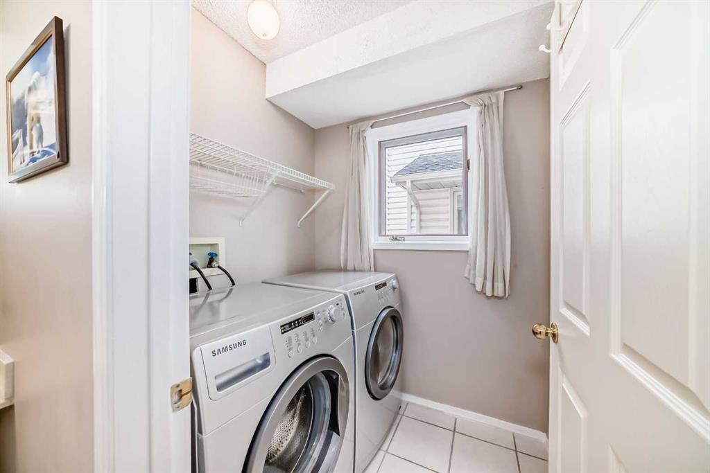 1405 Shawnee Road Sw, Calgary, AB - Indoor Photo Showing Laundry Room