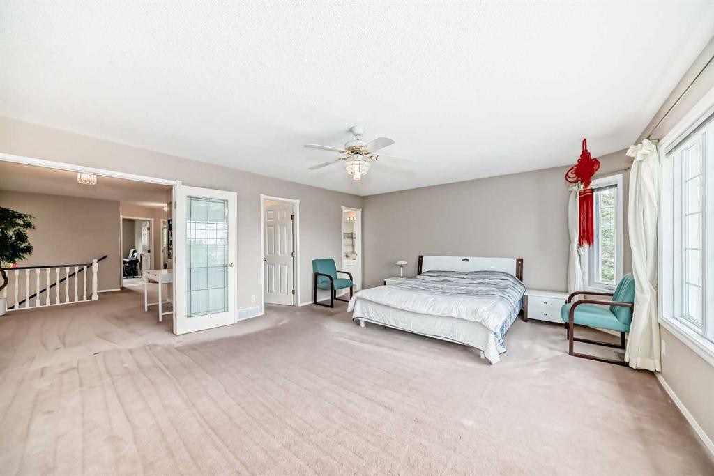 1405 Shawnee Road Sw, Calgary, AB - Indoor Photo Showing Bedroom