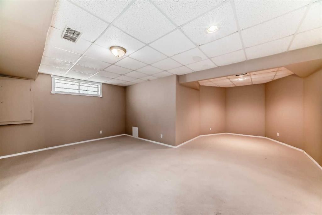 1405 Shawnee Road Sw, Calgary, AB - Indoor Photo Showing Basement