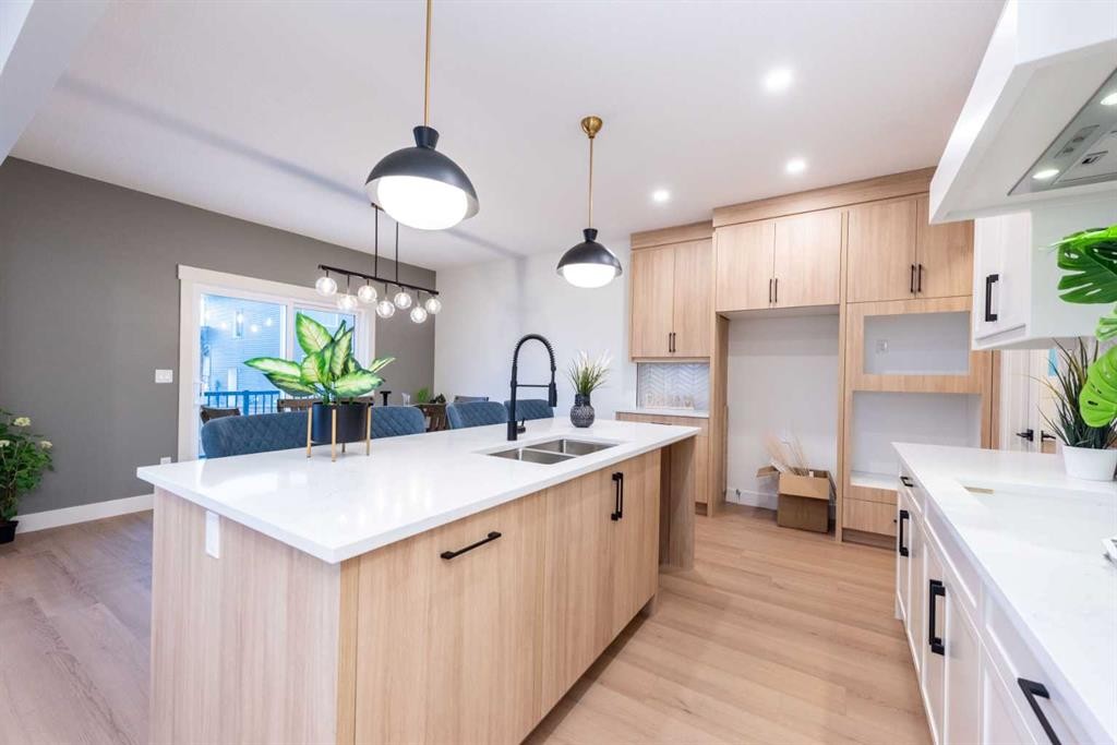 101 Waterford Passage, Chestermere, AB - Indoor Photo Showing Kitchen With Double Sink