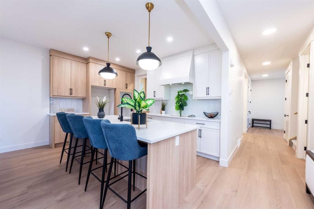 101 Waterford Passage, Chestermere, AB - Indoor Photo Showing Kitchen With Upgraded Kitchen