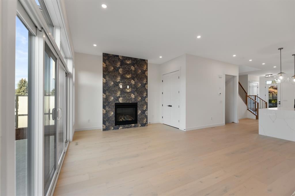 2436 30 Avenue Sw, Calgary, AB - Indoor Photo Showing Living Room With Fireplace