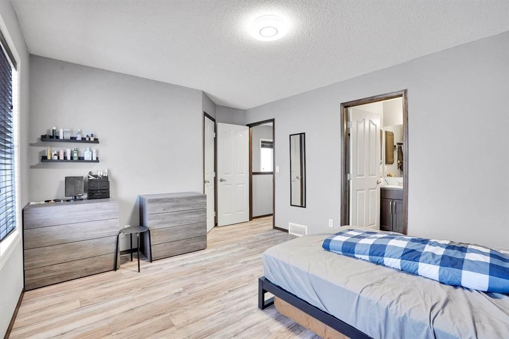 210 Cranberry Place Se, Calgary, AB - Indoor Photo Showing Bedroom