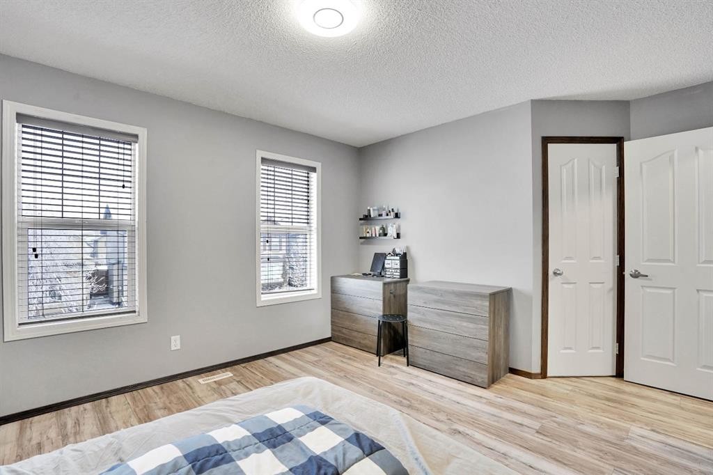 210 Cranberry Place Se, Calgary, AB - Indoor Photo Showing Bedroom