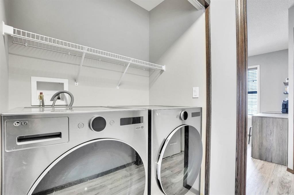 210 Cranberry Place Se, Calgary, AB - Indoor Photo Showing Laundry Room