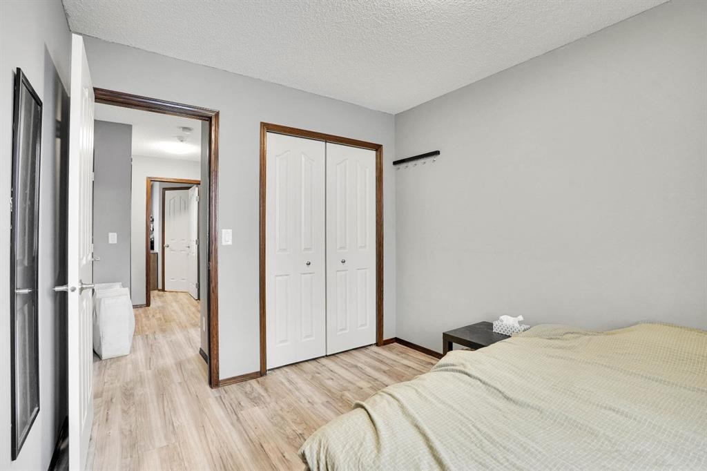 210 Cranberry Place Se, Calgary, AB - Indoor Photo Showing Bedroom