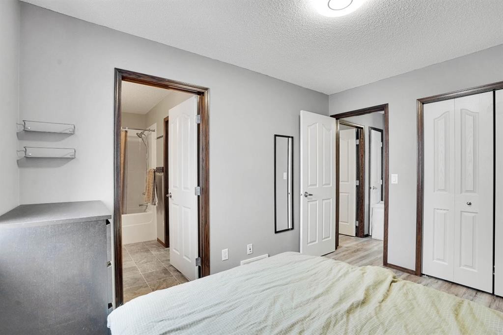 210 Cranberry Place Se, Calgary, AB - Indoor Photo Showing Bedroom