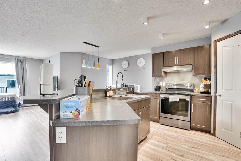 210 Cranberry Place Se, Calgary, AB - Indoor Photo Showing Kitchen