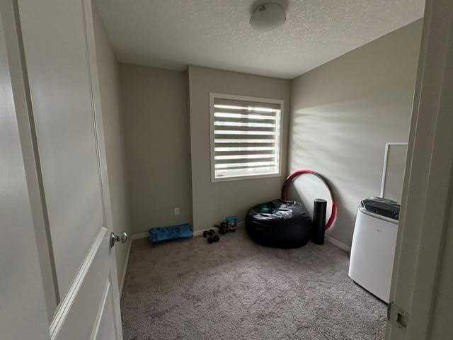 202 Evansridge Park Nw, Calgary, AB - Indoor Photo Showing Other Room