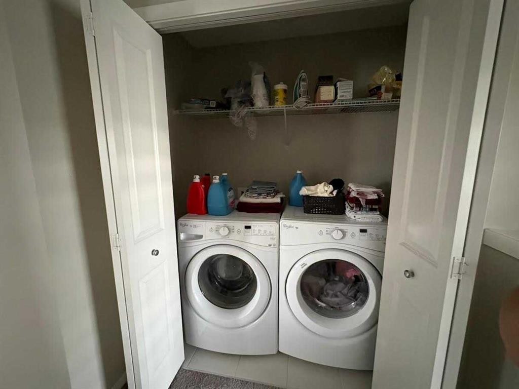 202 Evansridge Park Nw, Calgary, AB - Indoor Photo Showing Laundry Room