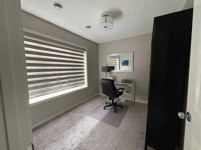202 Evansridge Park Nw, Calgary, AB - Indoor Photo Showing Other Room