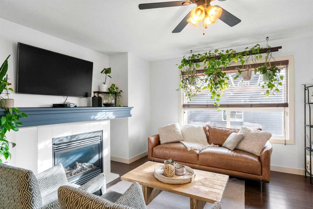 263 Evanston Way Nw, Calgary, AB - Indoor Photo Showing Living Room With Fireplace