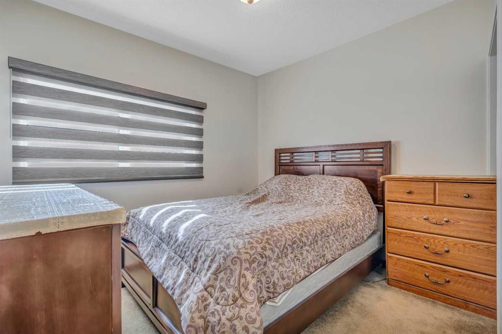 713 44 Street Se, Calgary, AB - Indoor Photo Showing Bedroom
