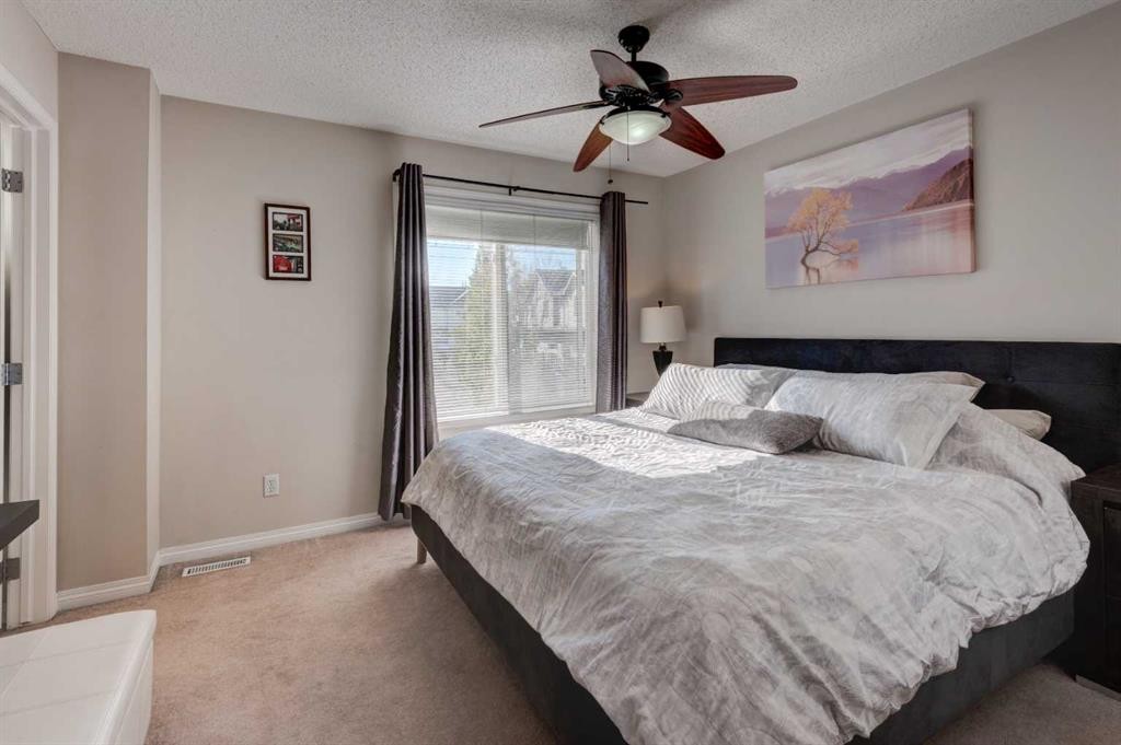 219 Copperfield Lane Se, Calgary, AB - Indoor Photo Showing Bedroom