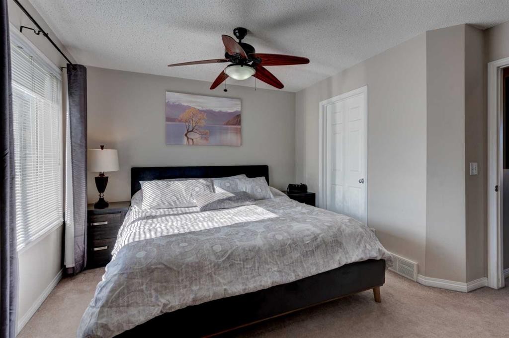 219 Copperfield Lane Se, Calgary, AB - Indoor Photo Showing Bedroom