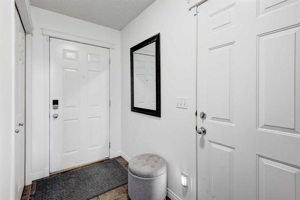 219 Copperfield Lane Se, Calgary, AB - Indoor Photo Showing Other Room