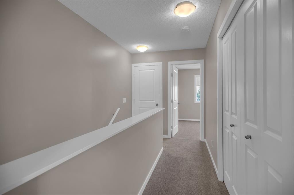 136 New Brighton Point Se, Calgary, AB - Indoor Photo Showing Other Room