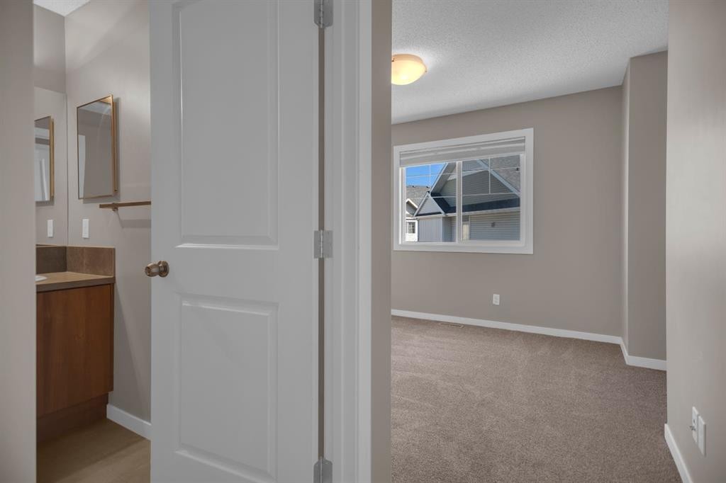 136 New Brighton Point Se, Calgary, AB - Indoor Photo Showing Other Room