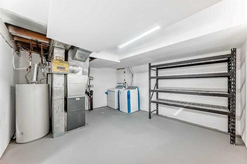 15104 1 Street Se, Calgary, AB - Indoor Photo Showing Basement