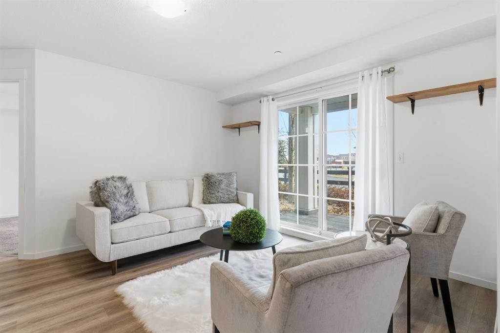 4114-99 Copperstone Park Se, Calgary, AB - Indoor Photo Showing Living Room