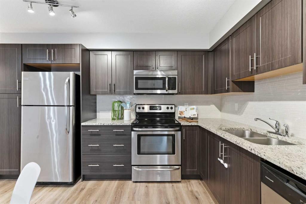 4114-99 Copperstone Park Se, Calgary, AB - Indoor Photo Showing Kitchen With Double Sink With Upgraded Kitchen