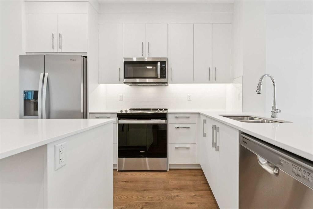 122-1862 Cornerstone Boulevard, Calgary, AB - Indoor Photo Showing Kitchen With Stainless Steel Kitchen With Double Sink With Upgraded Kitchen