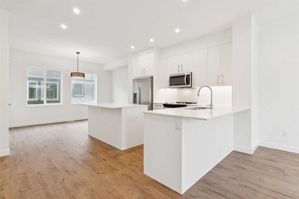 122-1862 Cornerstone Boulevard, Calgary, AB - Indoor Photo Showing Kitchen With Upgraded Kitchen