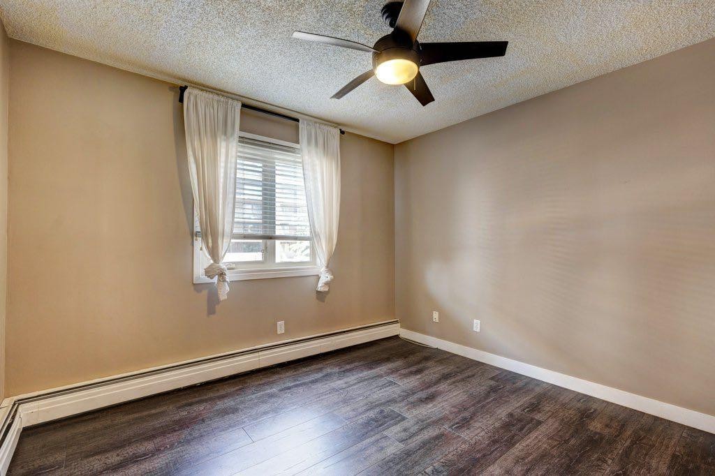 211-1335 12 Avenue Sw, Calgary, AB - Indoor Photo Showing Other Room