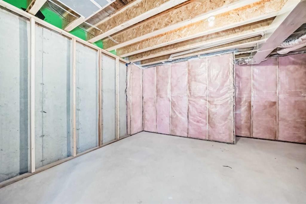 109 Heritage Park, Cochrane, AB - Indoor Photo Showing Basement