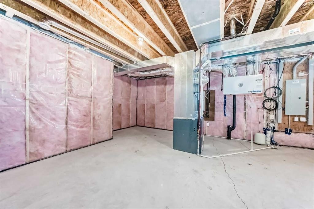 109 Heritage Park, Cochrane, AB - Indoor Photo Showing Basement