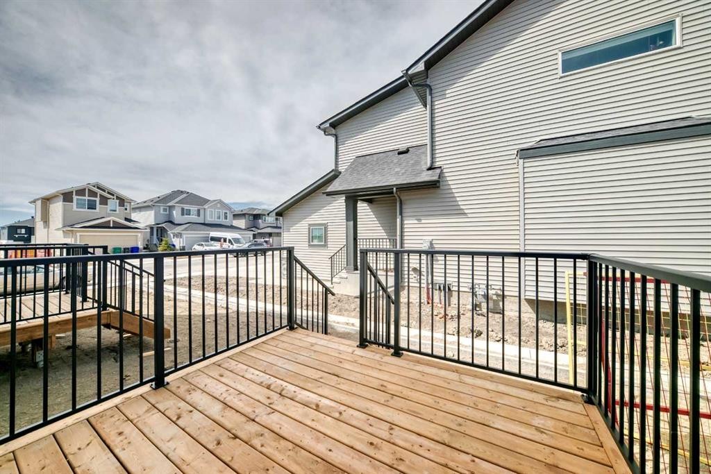 109 Heritage Park, Cochrane, AB - Outdoor With Deck Patio Veranda With Exterior