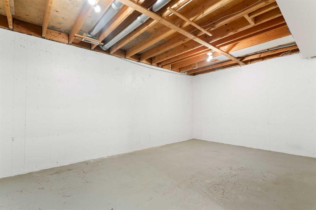 32-80 Galbraith Drive Sw, Calgary, AB - Indoor Photo Showing Basement