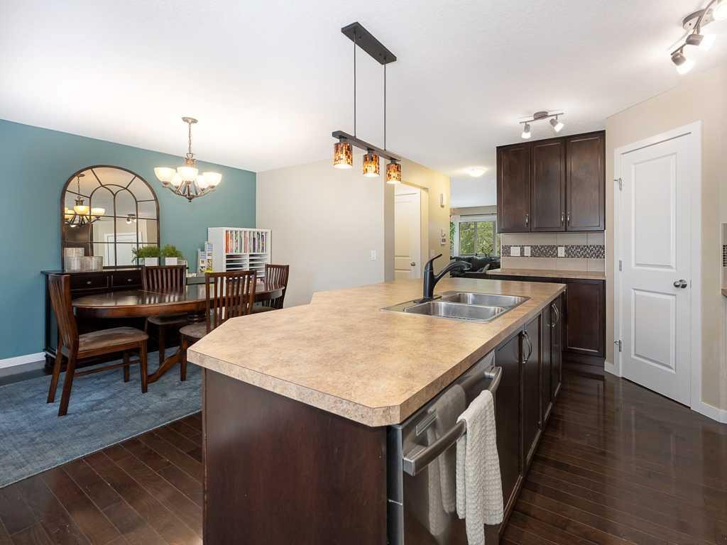 14 Walden Road Se, Calgary, AB - Indoor Photo Showing Kitchen With Double Sink