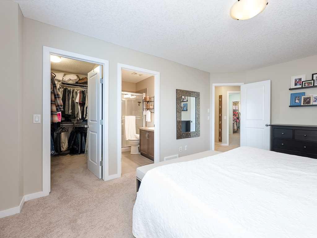 14 Walden Road Se, Calgary, AB - Indoor Photo Showing Bedroom