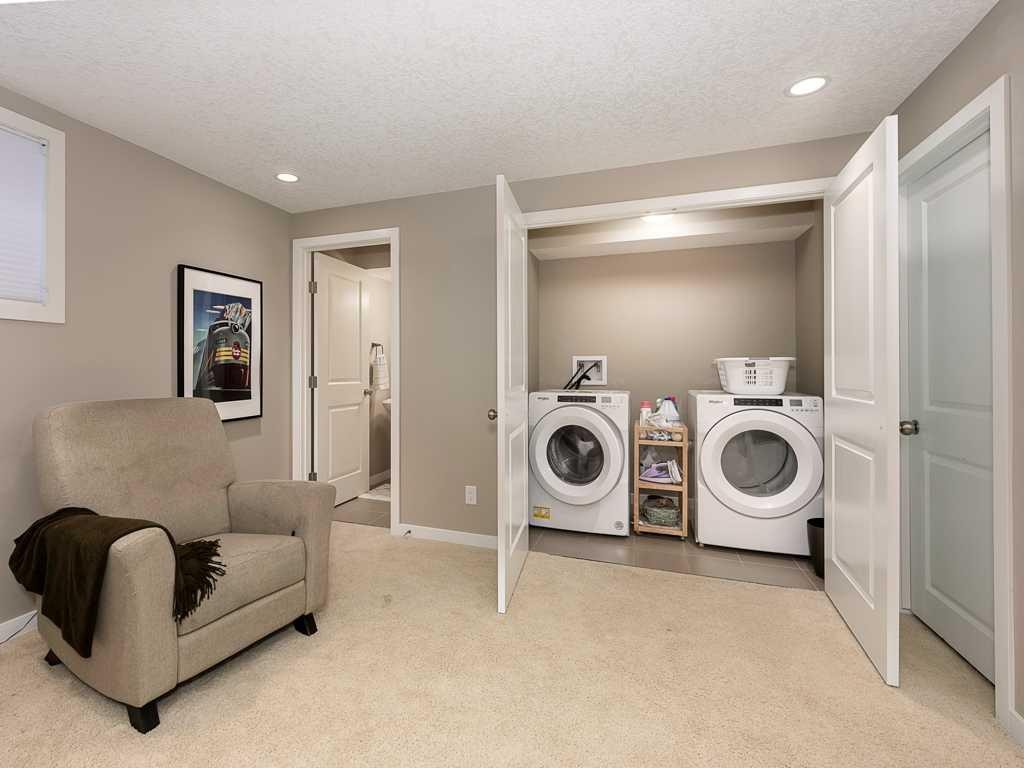 14 Walden Road Se, Calgary, AB - Indoor Photo Showing Laundry Room