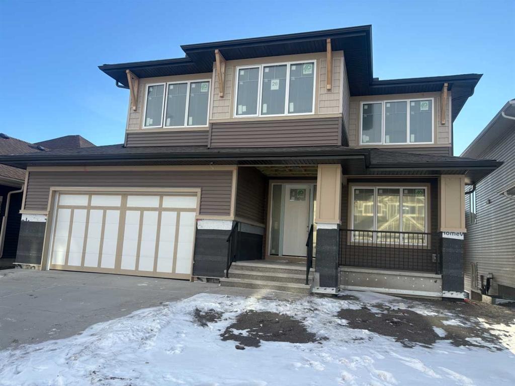 26 Heritage Close, Cochrane, AB - Outdoor With Facade