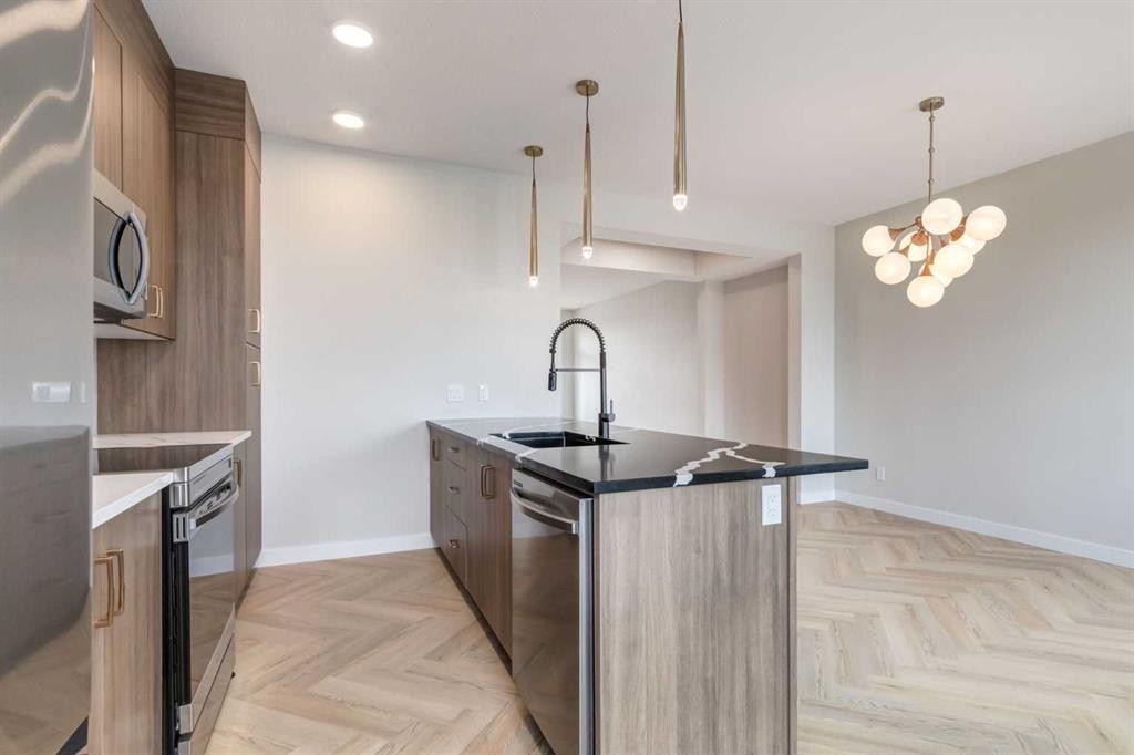 470 River Avenue, Cochrane, AB - Indoor Photo Showing Kitchen With Upgraded Kitchen