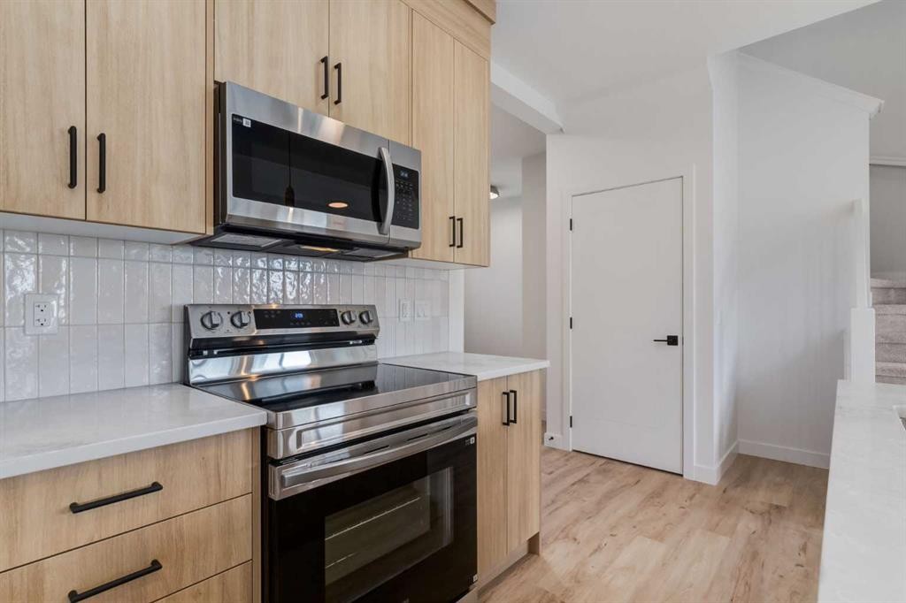 86 Agate Road, Cochrane, AB - Indoor Photo Showing Kitchen